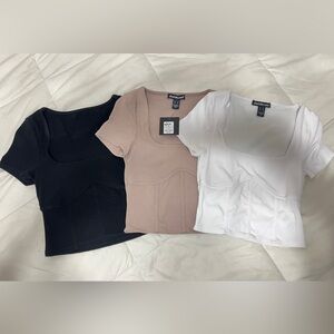 White, Tan, and Black Ribbed Tops